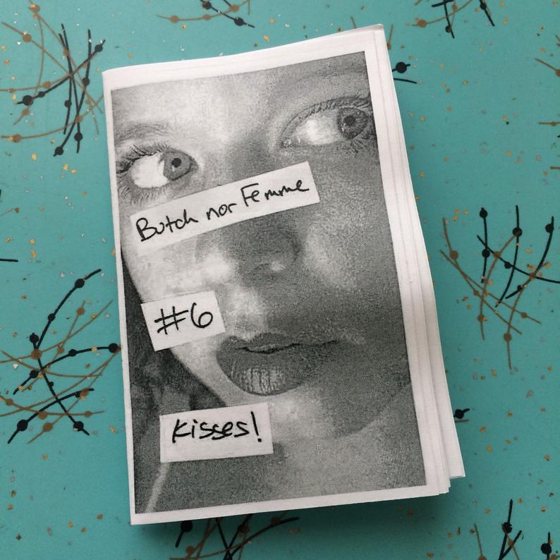 photo of zine on 1950s looking formica. cover is close-up photo of a person's face with the zine title cut and pasted over it