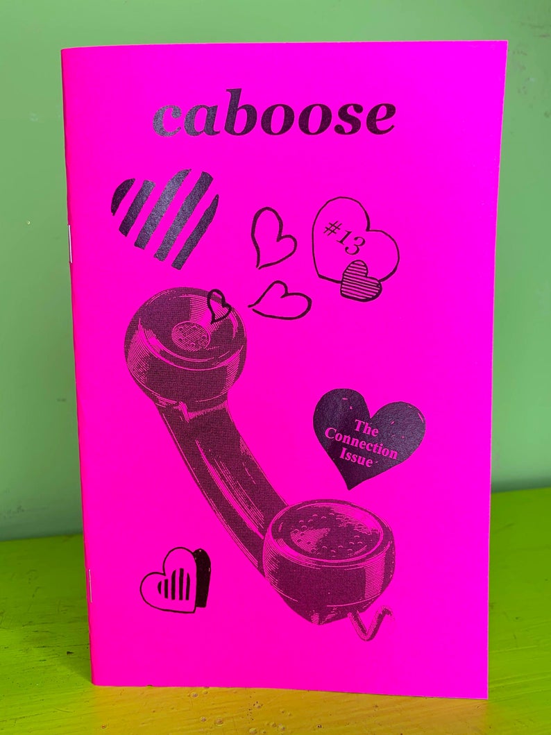 photo of zine: telephone receiver and hearts on hot pink