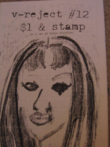 zine cover: charcoal drawing of a person with long hair