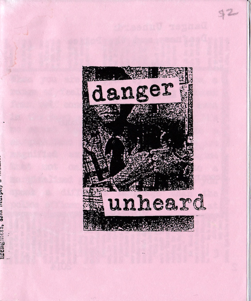 pink zine cover with the title text in lower case letters over clip art of a person in a suit holding up two thumbs