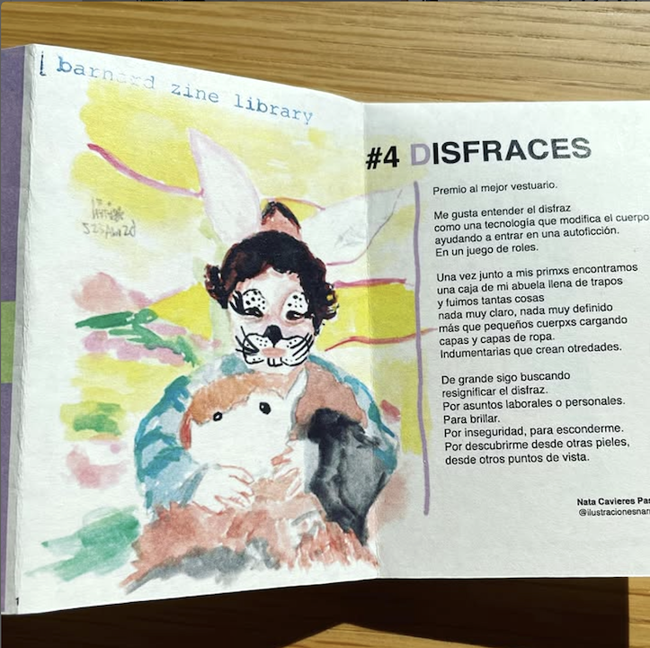 photo of an open zine with a watercolor painting of a humanoid rabbit person on the left and the text of a poem on the right