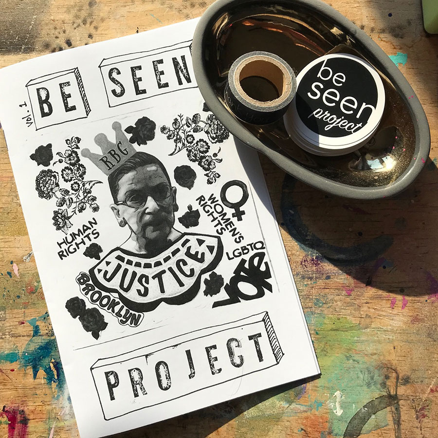 Be Seen zine cover: collage with RBG in the middle, rubber stamped title? 