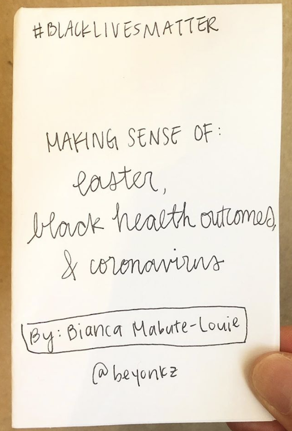 photo of the zine Making Sense of Easter, Black Health, and the creator's thumb holding the zine