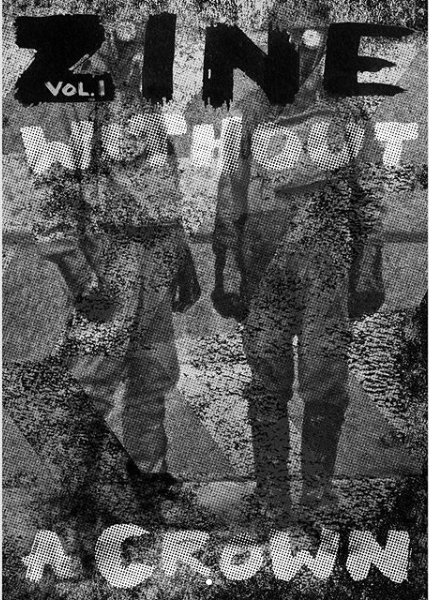 zine cover: grainy/dirty lens photo of soldiers (?) with handwritten, all-caps title obscuring their faces